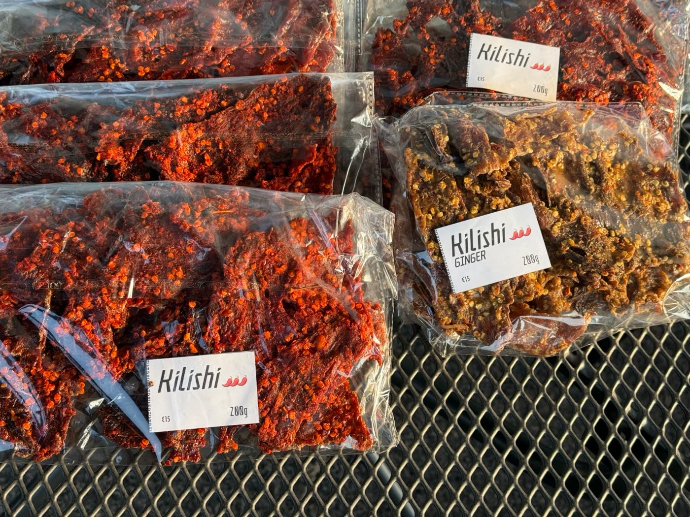Pouches of red, chili-coated Kilishi Classic